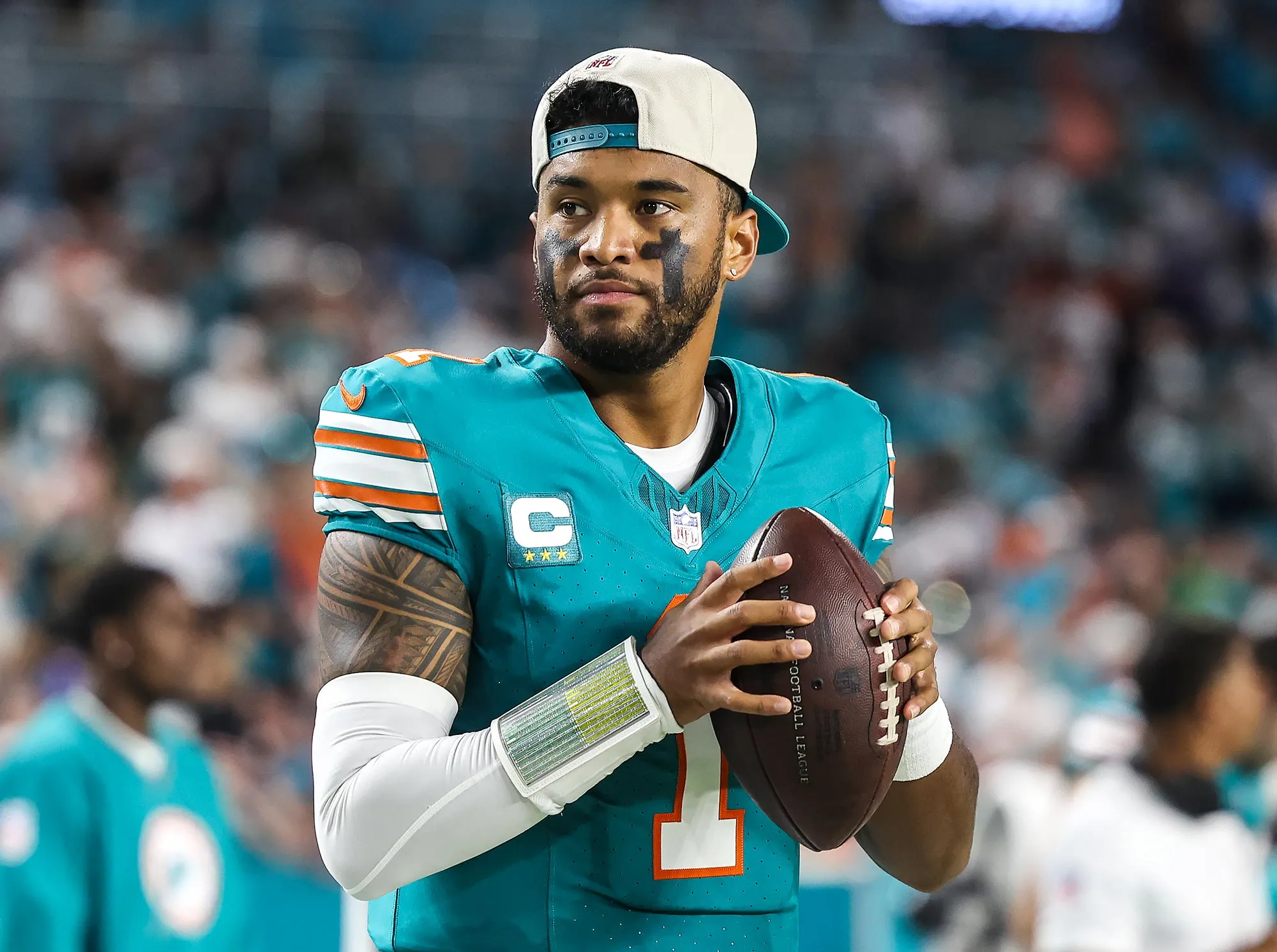 Miami Dolphins QB Tua Tagovailoa Hospitalized for Head and Neck Injuries Everything to Know About His Health Controversy