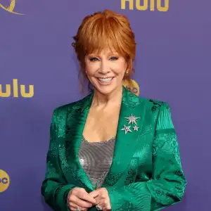 Reba McEntire and Her Sugar Tot Rex Linn Step Out at the 2024 Emmy Awards 100