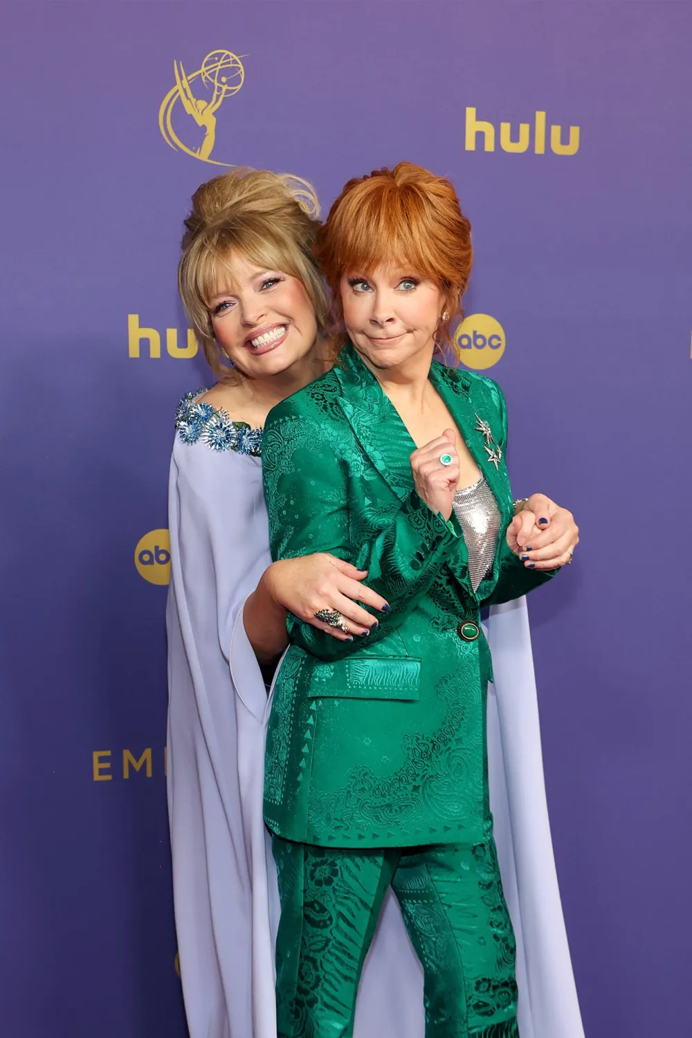 Reba McEntire and Her Sugar Tot Rex Linn Step Out at the 2024 Emmy Awards 103