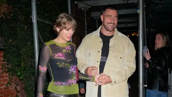 Travis Kelce Says He s Cool With Being Taylor Swift s Arm Candy