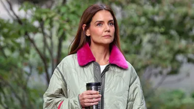 Katie Holmes in green jacket