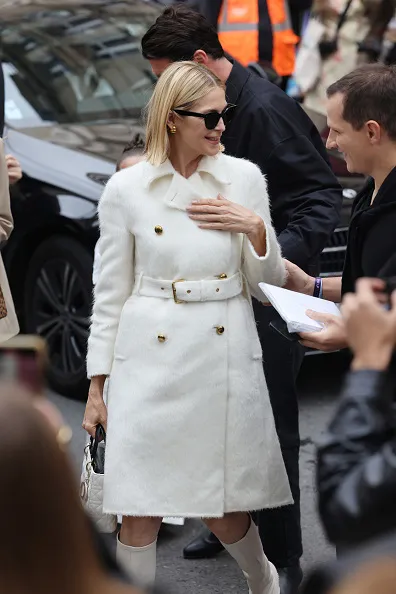 kelly rutherford wearing white dior coat