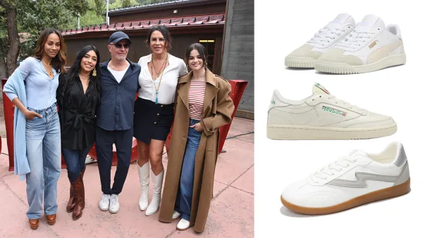 Zoe Saldana, Adriana Paz, Jacques Audiard, Karla Sofia Gascon and Selena Gomez attend a screening of "Emilia Perez" flanked by three white sneakers