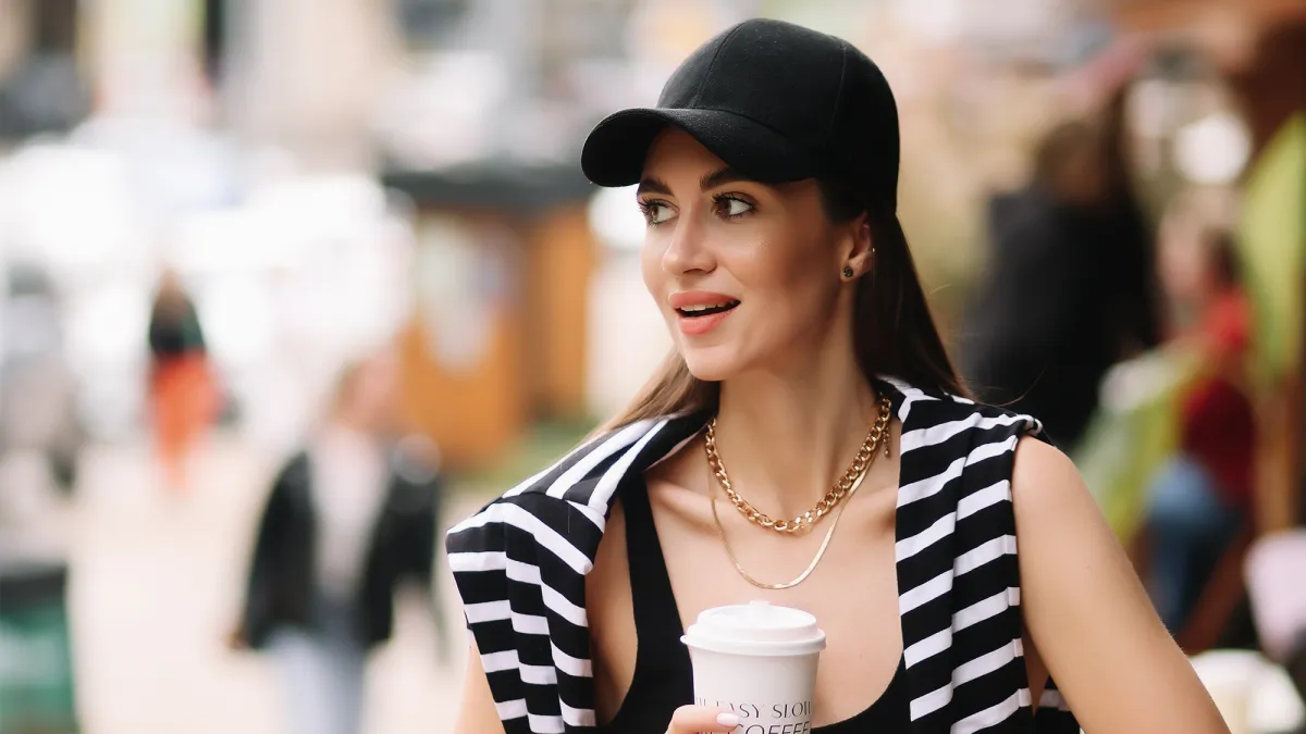 woman wearing a pin stripe top on a street