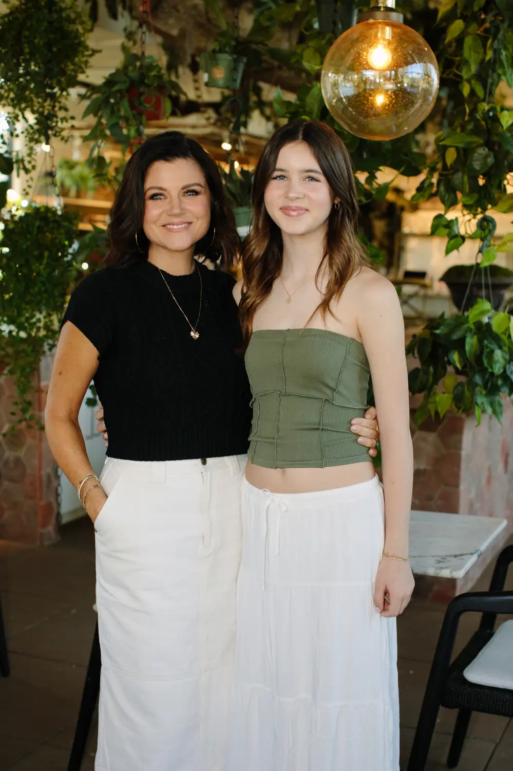 Tiffani Thiessen and daughter at t Cosette Wine Bar and was produced by Jason Rhee of the Rheefined Company