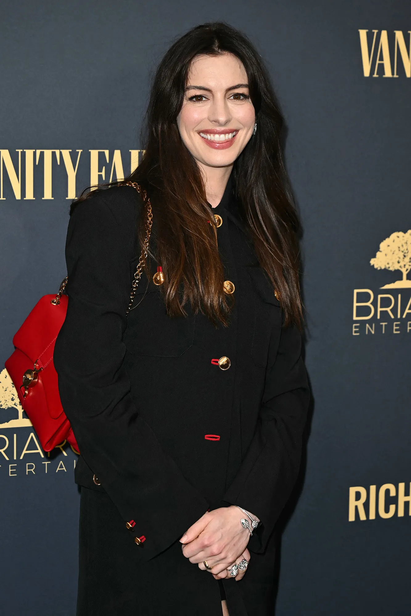 Anne Hathaway's Fall Coat Is Far Too Chic for Coat Check