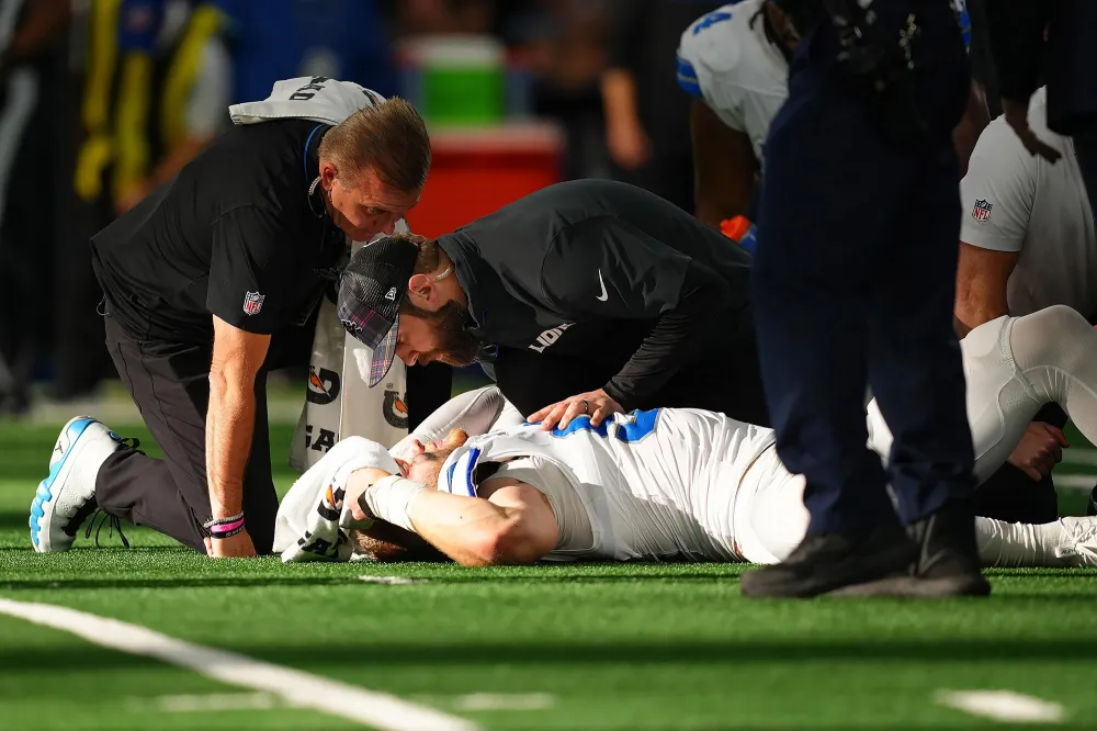 Eminem Offers Blunt 1 Word Response to Lions Aidan Hutchinsons Brutal Leg Injury