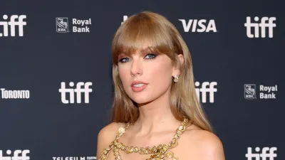 Taylor Swift Fuels Reputation Taylors Version Theories With Snakeskin Bag on Travis Kelce Date