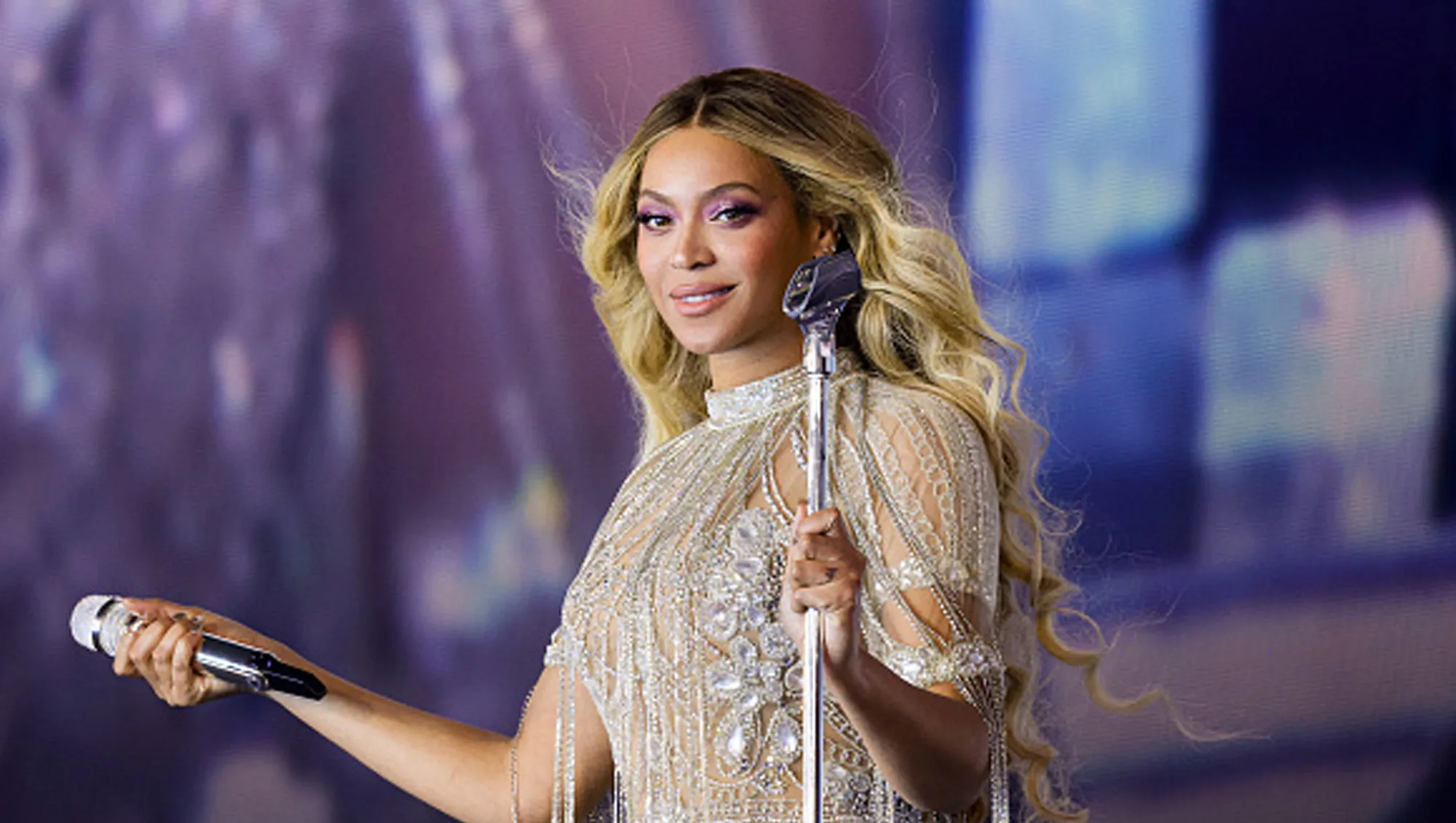 beyonce in silver rhinestone outfit on stage