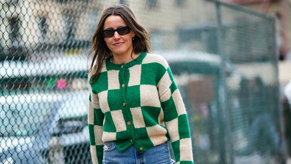 woman wearing green checkered cardigan