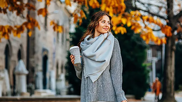 Autumn portrait of a beautiful young woman outdoors.