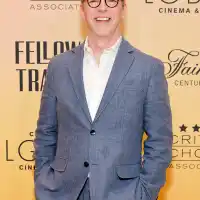 Sean Hayes smiling at camera