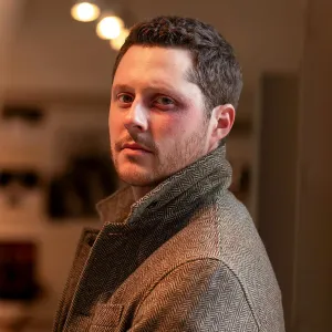 EXCL Schitt s Creek Fans Can See Noah Reid Back at His Most Wholesome on Murder in a Small Town