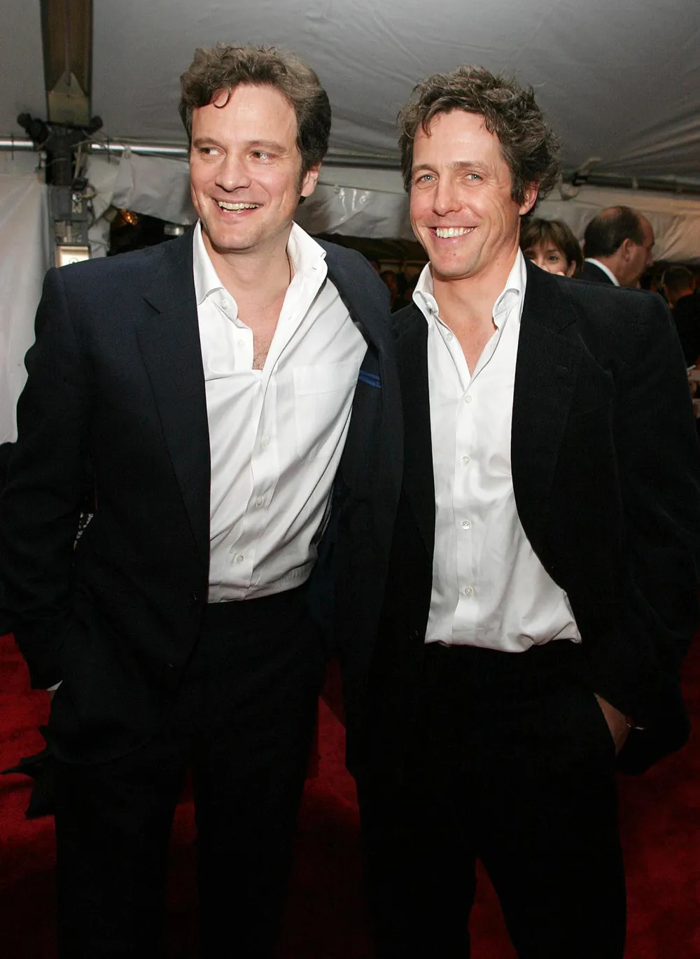 Hugh Grant Jokes That a Colin Firth Box Office Bomb Is His Idea of Perfect Happiness