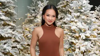 Jenn Tran Gets Hippy in Sexy Brown Dress