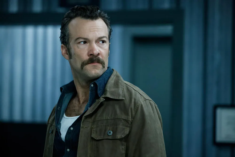 Kyle Schmid Reveals Mark Harmons Advice to Playing NCIS Origins Hippie Cowboy Mike Franks