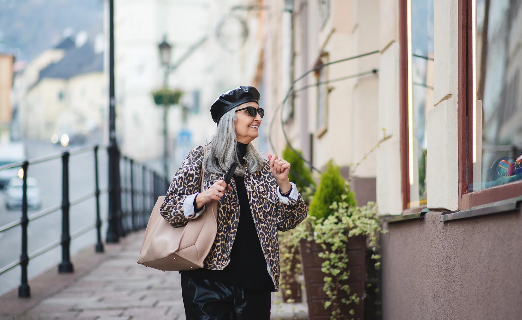 Old woman wearing fashionable clothes.