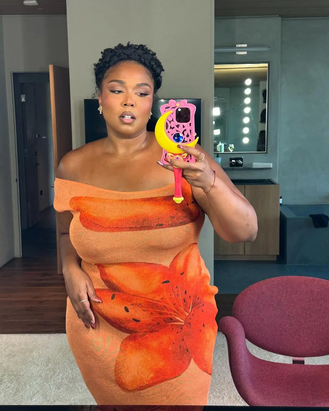 Lizzo Flaunts Her Figure in Orange Thanksgiving Outfit After Dismissing Ozempic Rumors