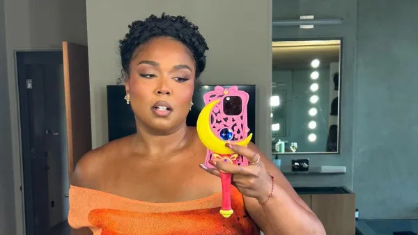 Lizzo Flaunts Her Figure in Orange Thanksgiving Outfit After Dismissing Ozempic Rumors