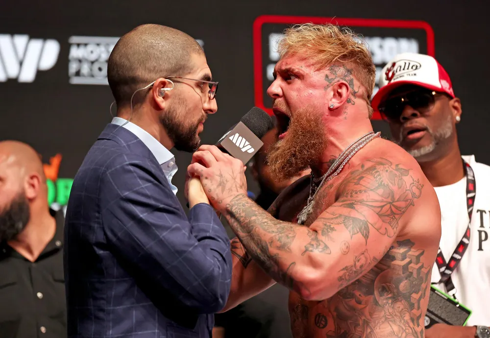 Mike Tyson Slaps Jake Paul During Weigh-In for Upcoming Boxing Match 2