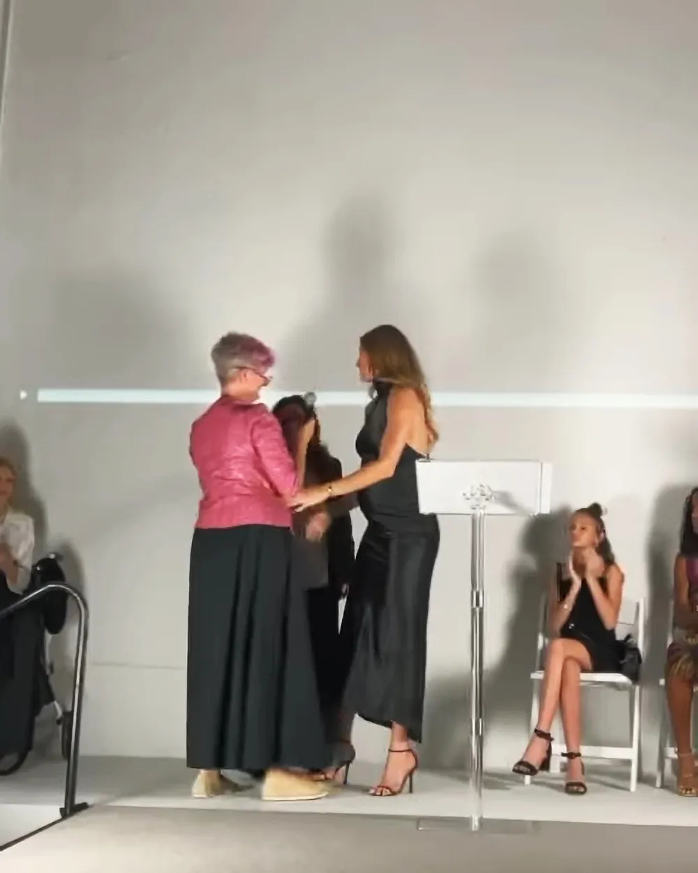 Pregnant Gisele Bundchen Debuts Baby Bump at Lotus House Gala