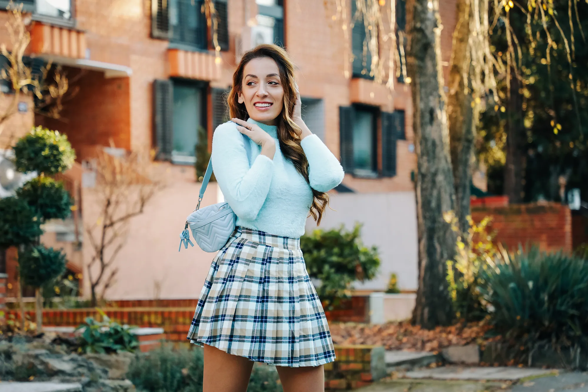 Young pretty fashioned woman outdoors