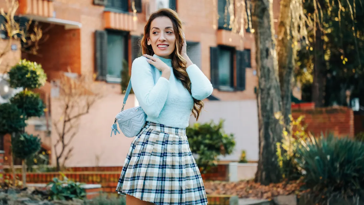 Young pretty fashioned woman outdoors