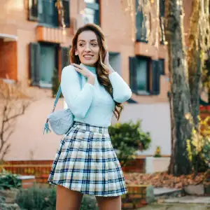 Young pretty fashioned woman outdoors