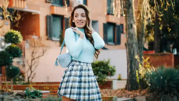 Young pretty fashioned woman outdoors