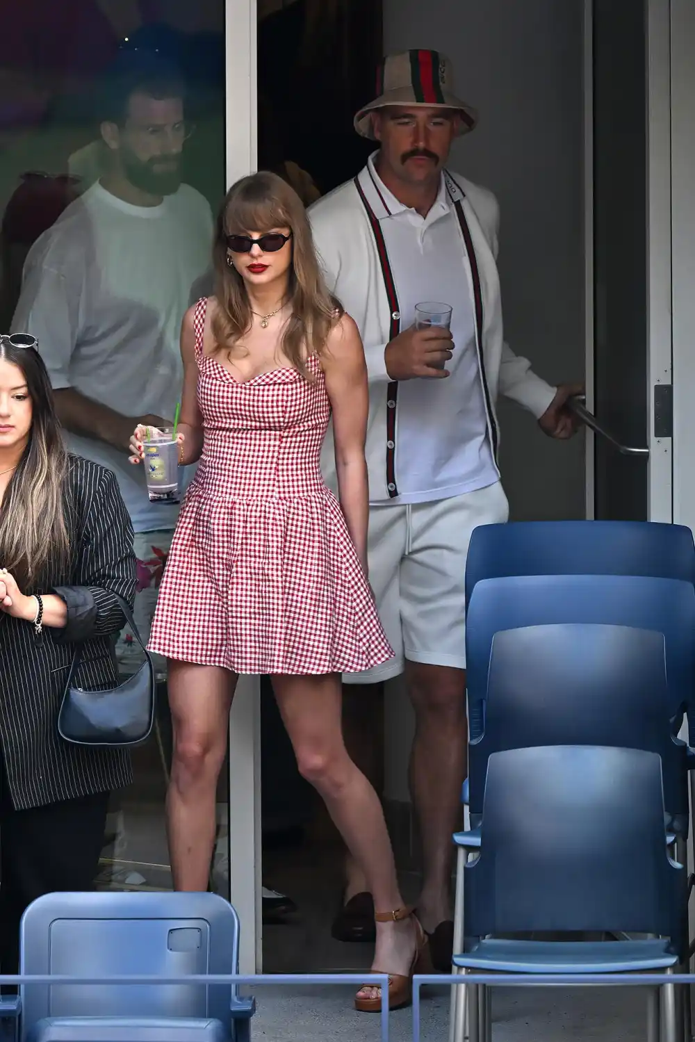 The Wildest Fan Theories About Why Taylor Swift Keeps Wearing Plaid