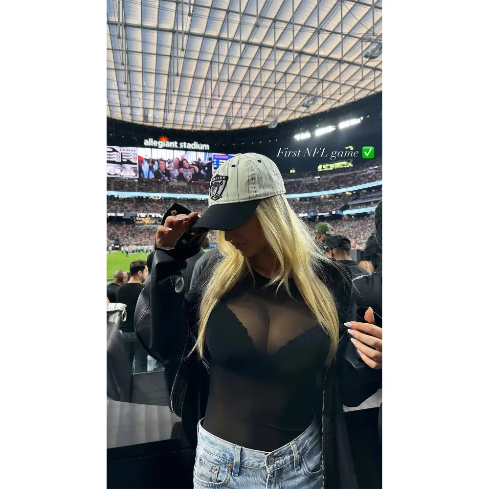 Viral Ring Girl Sydney Thomas Attends 1st NFL Game in Revealing Black Outfit