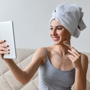 Smiling Female Enjoying The State Of Her Skin After Bath