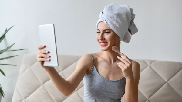 Smiling Female Enjoying The State Of Her Skin After Bath
