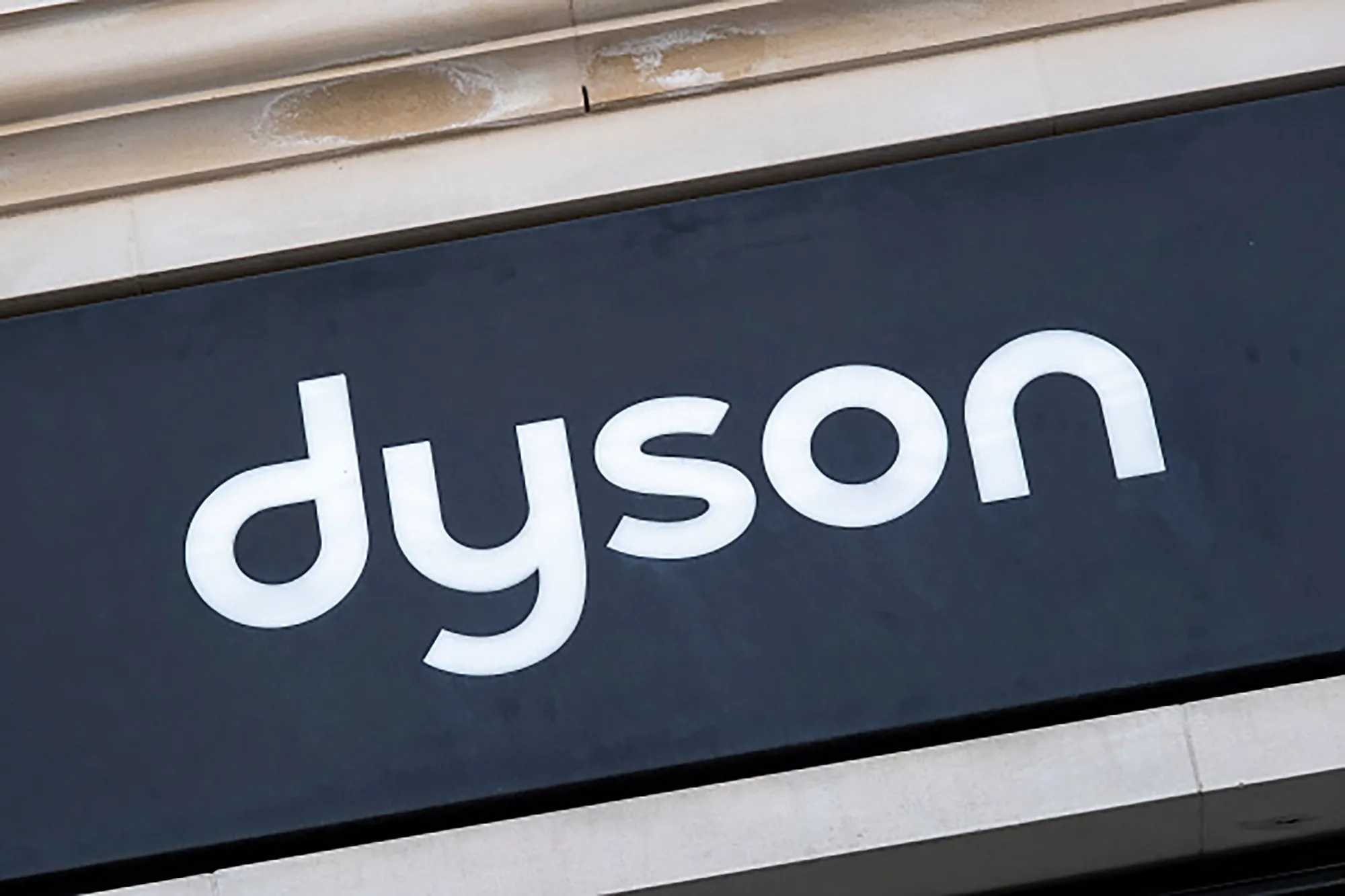 Sign for the household appliance brand Dyson on 26th August 2024 in London, United Kingdom. Dyson, is a Singaporean multinational technology company founded in 1991 by James Dyson the UK. The company designs and manufactures household appliances such as vacuum cleaners, air purifiers, hand dryers, bladeless fans, heaters, hair dryers, and lights. (photo by Mike Kemp/In Pictures via Getty Images)