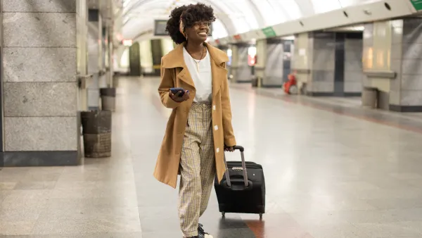 A young female tourist is enjoying her trip