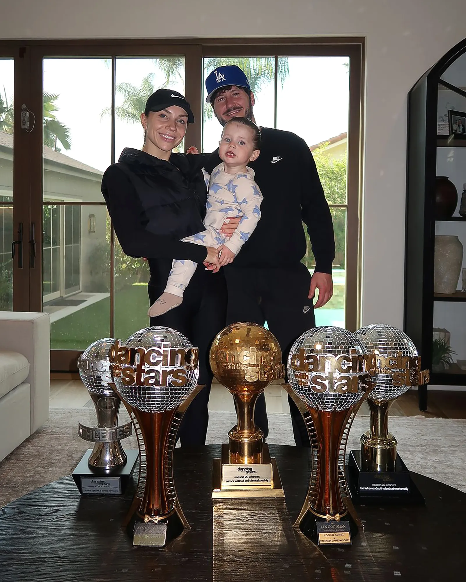DWTS' Jenna and Val Line Up Their Collective Mirrorball Trophies for Family Photo With Son Rome