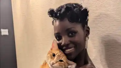 Gallery Update: Celebrities Obsessed with their cats (Lupita and YoYo)