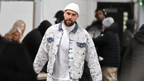 Travis Kelce High-Fives Very Excited Taylor Swift Fan in 'Eras Tour' Merch After Chiefs Game