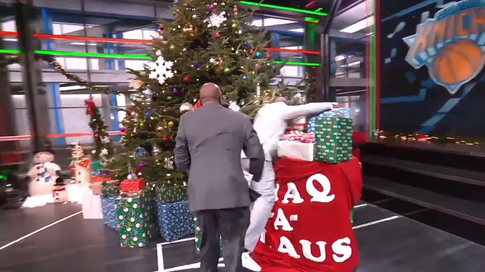 Kenny Smith Pushes Shaquille O'Neal Into a Christmas Tree on Live TV
