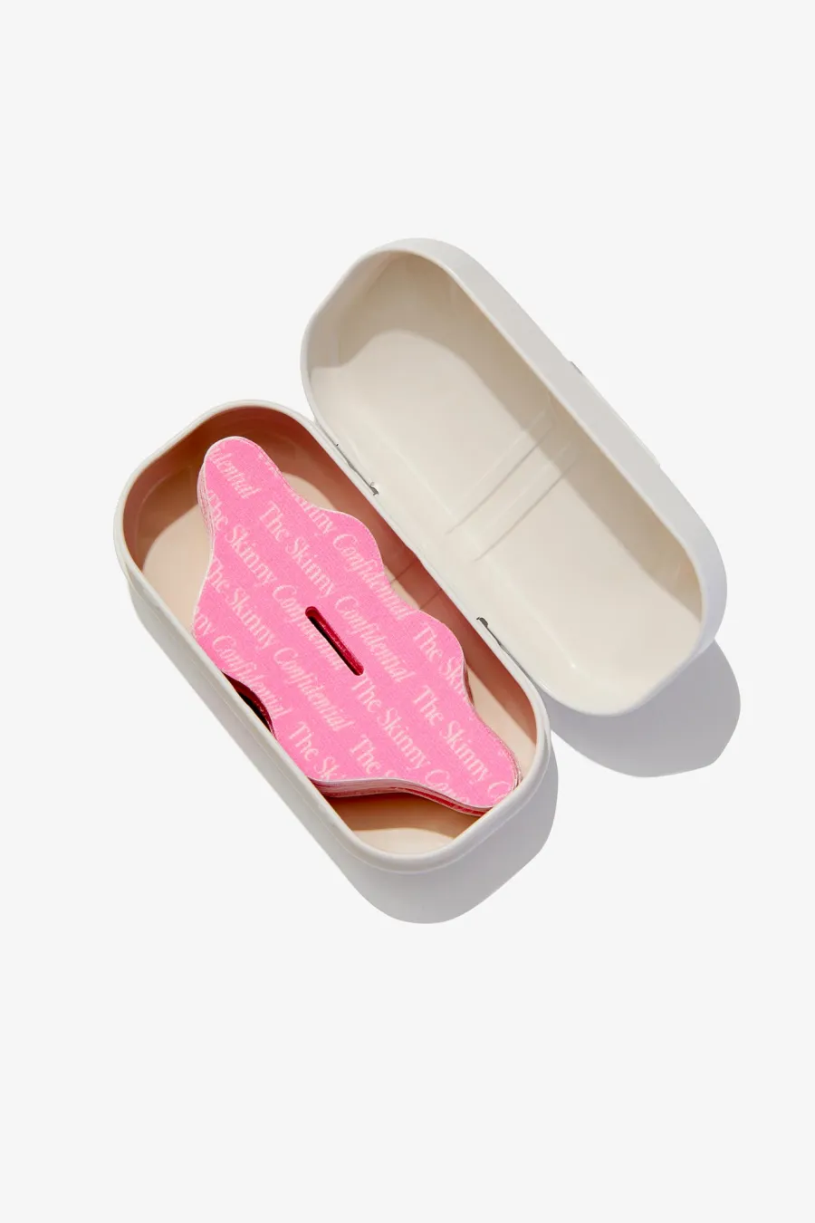 Lauryn Bosstick holding her peptide product 170