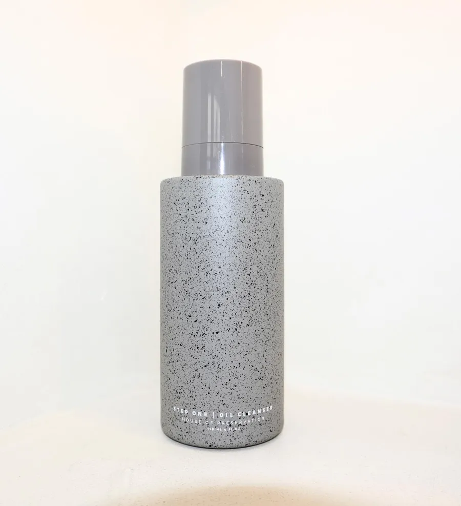 Lauryn Bosstick holding her peptide product 174