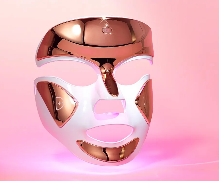 Lauryn Bosstick holding her peptide product 177