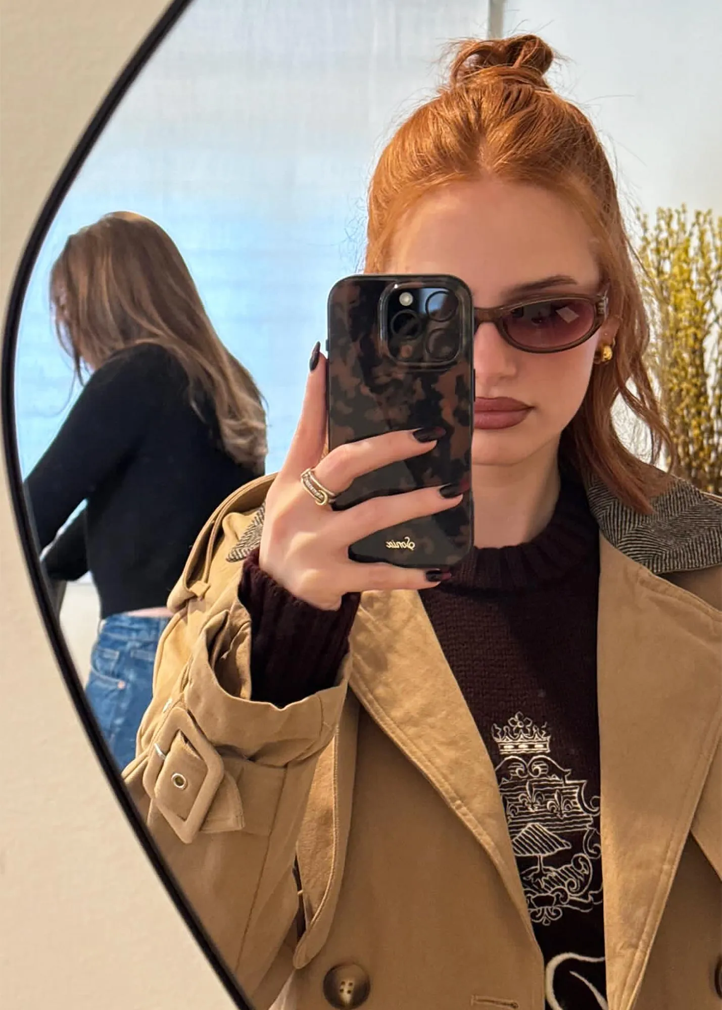 Madelaine Petsch Plays With Maroons in Stylish Snap
