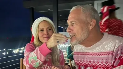 Mark Anderson and Barbara Alyn Woods holiday sweaters