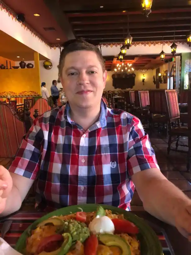 Journalist Nick Hazleton eating at a San Diego Mexican restaurant