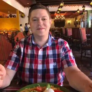 Journalist Nick Hazleton eating at a San Diego Mexican restaurant