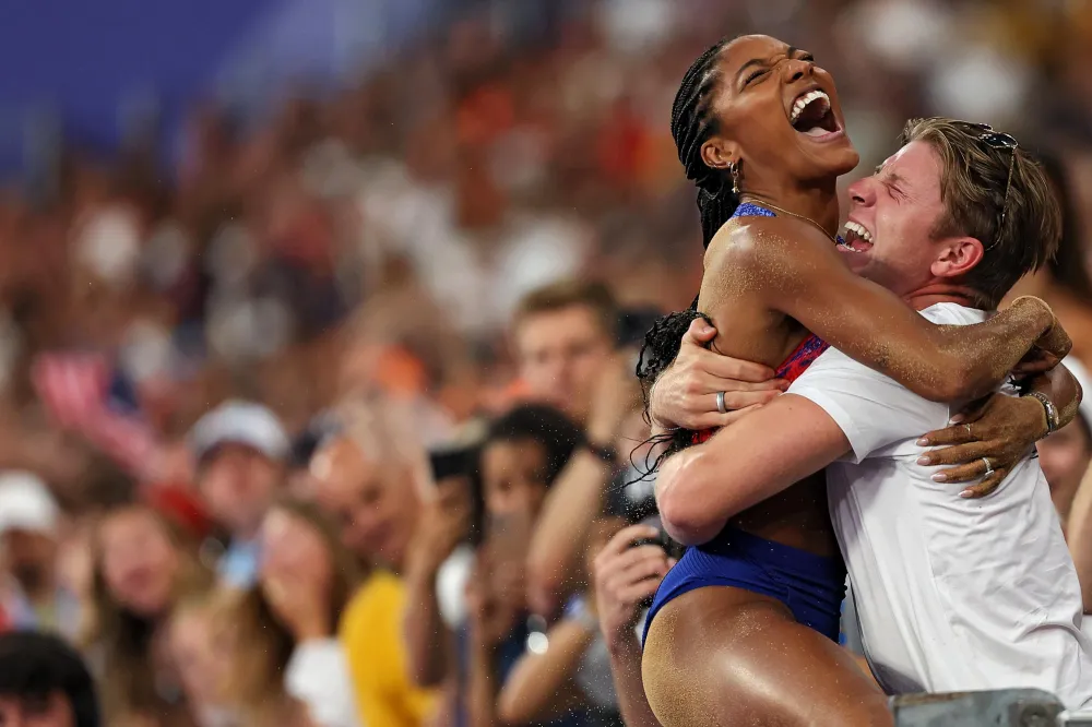 Olympians Tara Davis Woodhall and Hunter Woodhall Weren t Taken Seriously Before Getting Married 096