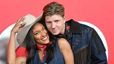 Olympians Tara Davis Woodhall and Hunter Woodhall Weren t Taken Seriously Before Getting Married 097