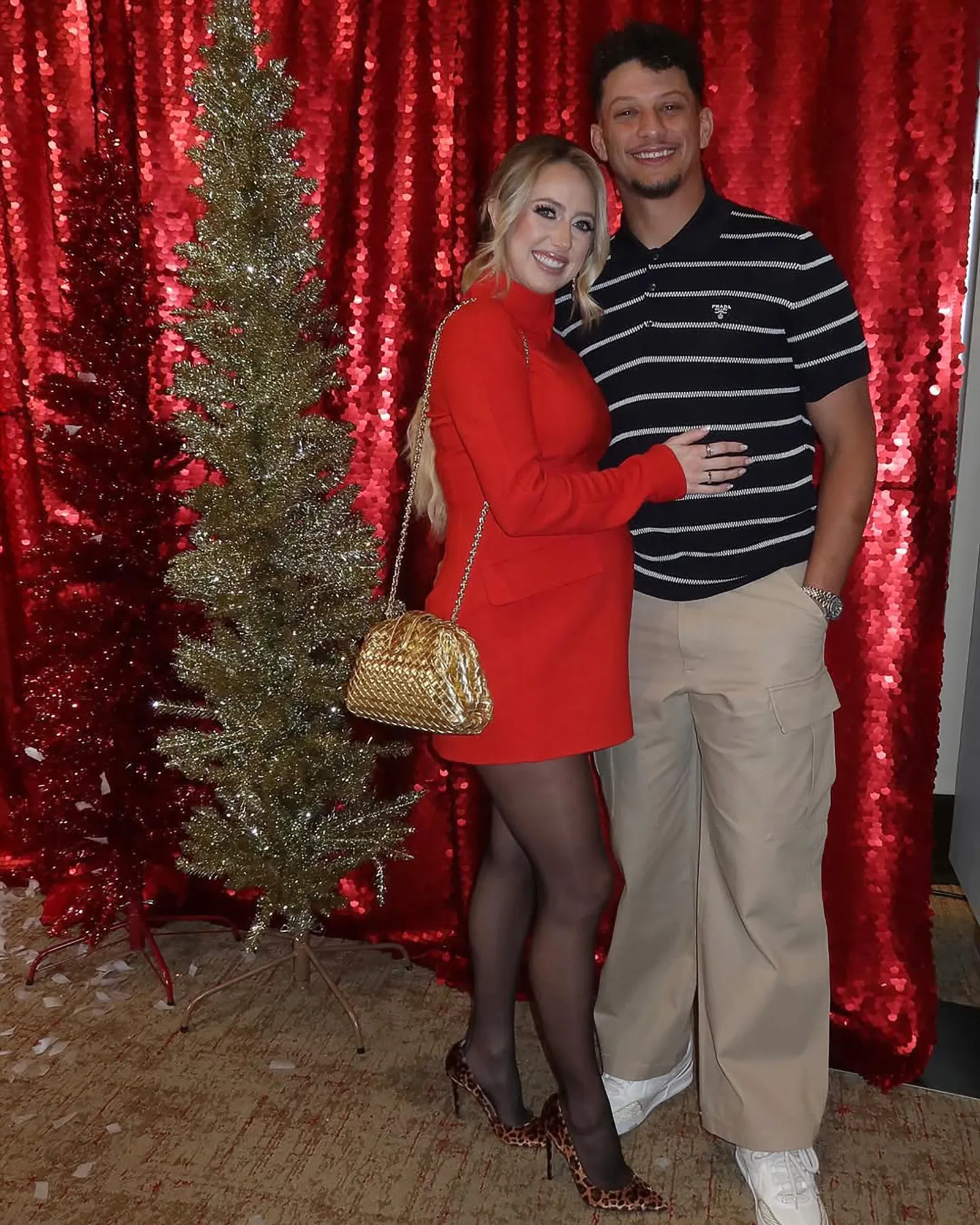 Patrick Mahomes and Pregnant Wife Brittany Cuddle Up at Chiefs Christmas Party