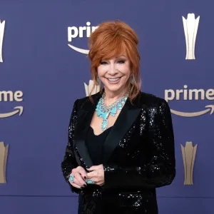 US singer Reba McEntire arrives for the 59th Academy of Country Music awards (ACM) at Ford Center in The Star in Frisco, Texas, May 16, 2024. (Photo by SUZANNE CORDEIRO / AFP) (Photo by SUZANNE CORDEIRO/AFP via Getty Images)
